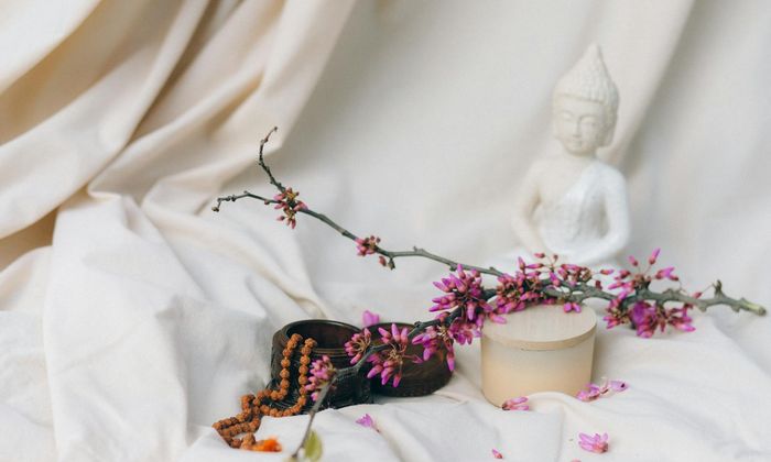 Woman in a calming yoga pose, symbolizing mind-body benefits.